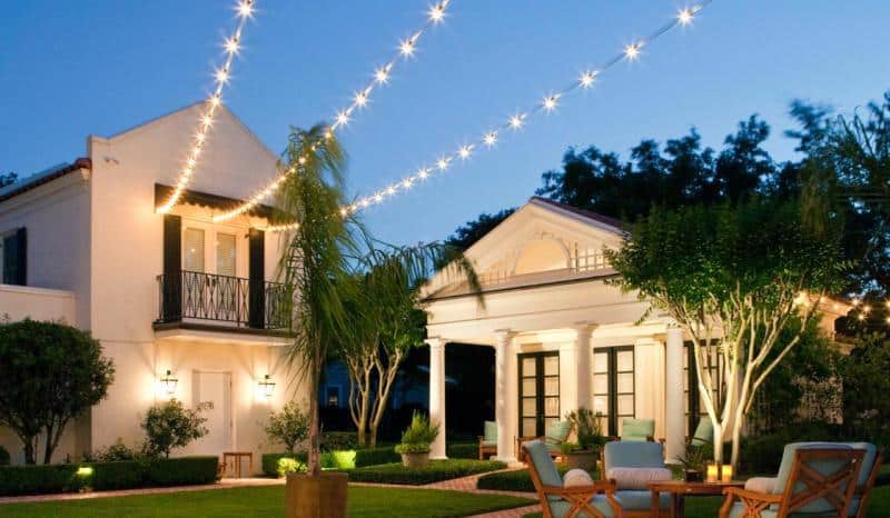 Light String Bulbs hung from House to Light Post for instant Patio Lighting