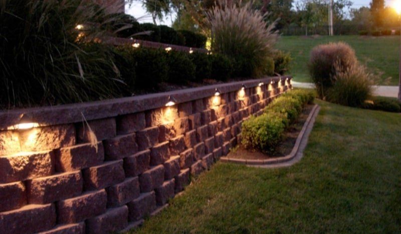 Landscape Planer Wall illuminated with LED Lights in a Landscape Lighting Project