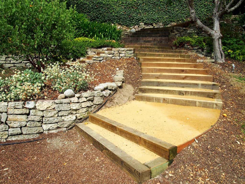 4x4 Wooden Timbers used to Create Steps filled in with Crushed Granite in a Landscaping Project
