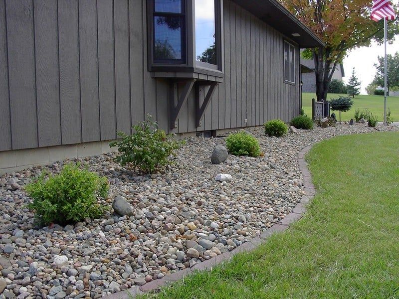 Landscape Garden Bed installed on side of the House using Pavers & Landscape Rock