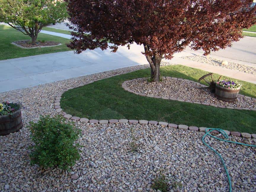 Landscape Rock installed with Sod to Create a nice Xeriscaped Lawn