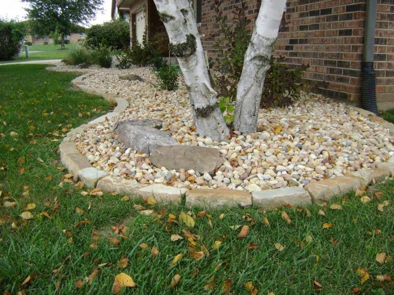 Landscape Bed with Natural Stone and 1" River Rock