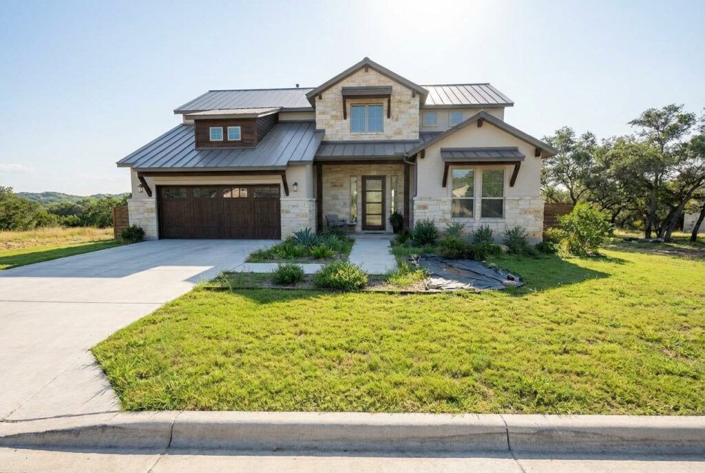 Ranch-style home before xeriscaping with subdued front yard landscaping and drought-tolerant landscape design